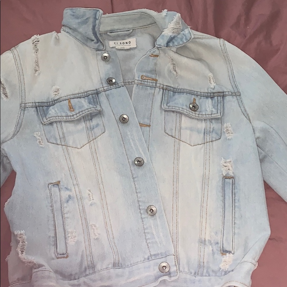 ripped jean jacket 🤎